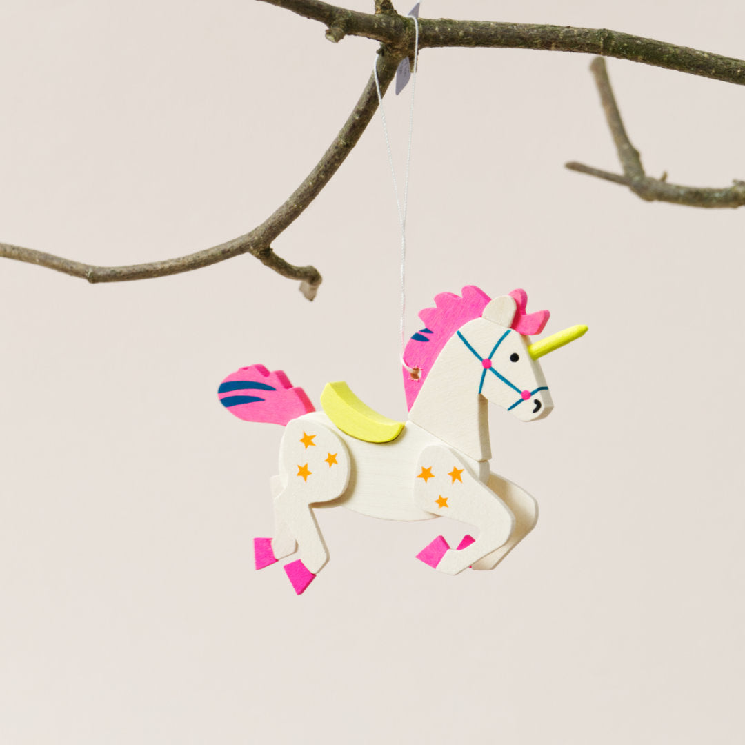 Einhorn-Aufhänger in Rosa-Gelb mit orangenen Sternchen