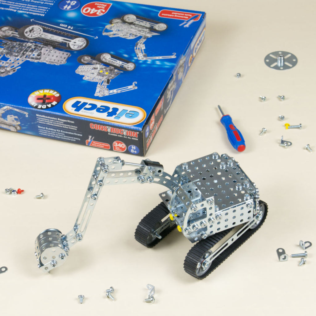 Bagger zum zusammen bauen aus Metall inklusive Werkzeug.