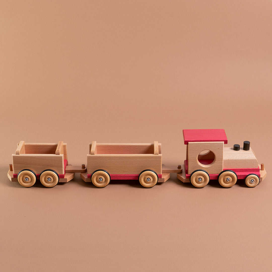 Eisenbahn mit zwei Anhängern, Seitenansicht.