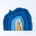 5 heiliges Höhlenset aus Holz von Glückskäfer in den Farben Orange und verschiedenen Blauabstufungen.