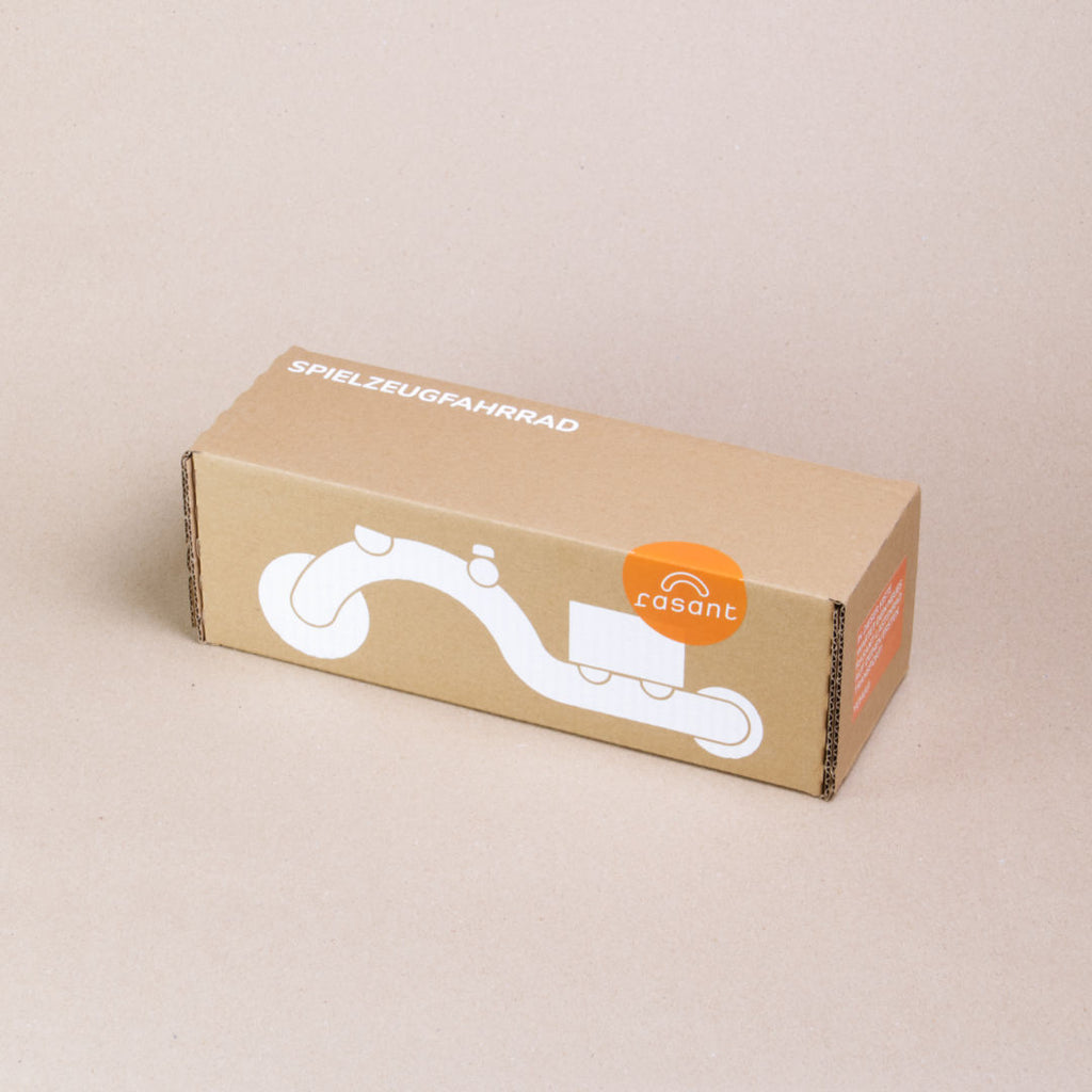 Verpackung des Lastenfahrrads von rasant in orange