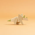 Triceratops Magnetpuzzle aus Holz mit grünen Elementen.