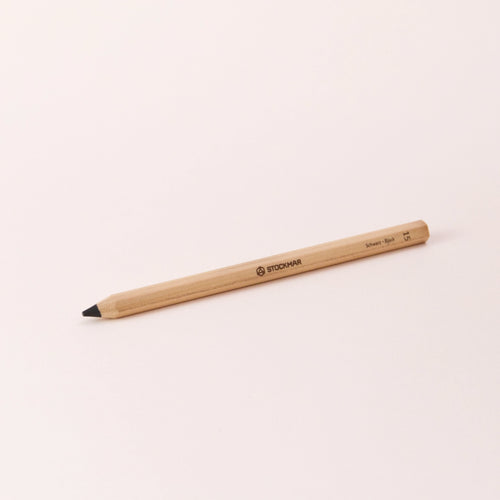 Stift von Stockmar in Schwarz, 6-eckig.