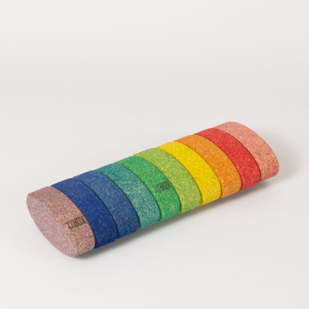 Korxx Form Oval in Regenbogenfarben, 10 Stück in eine Reihe gelegt