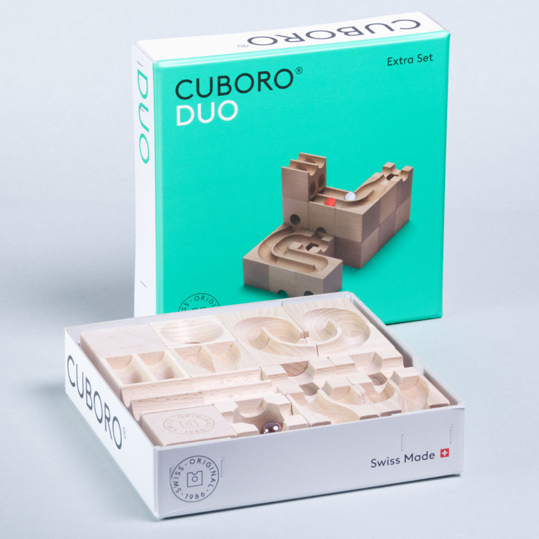Duo Set von Cuboro mit geöffneter Verpackung darin liegend.